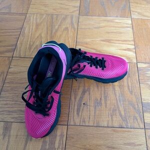Hoka sneakers in raspberry pink with black sole